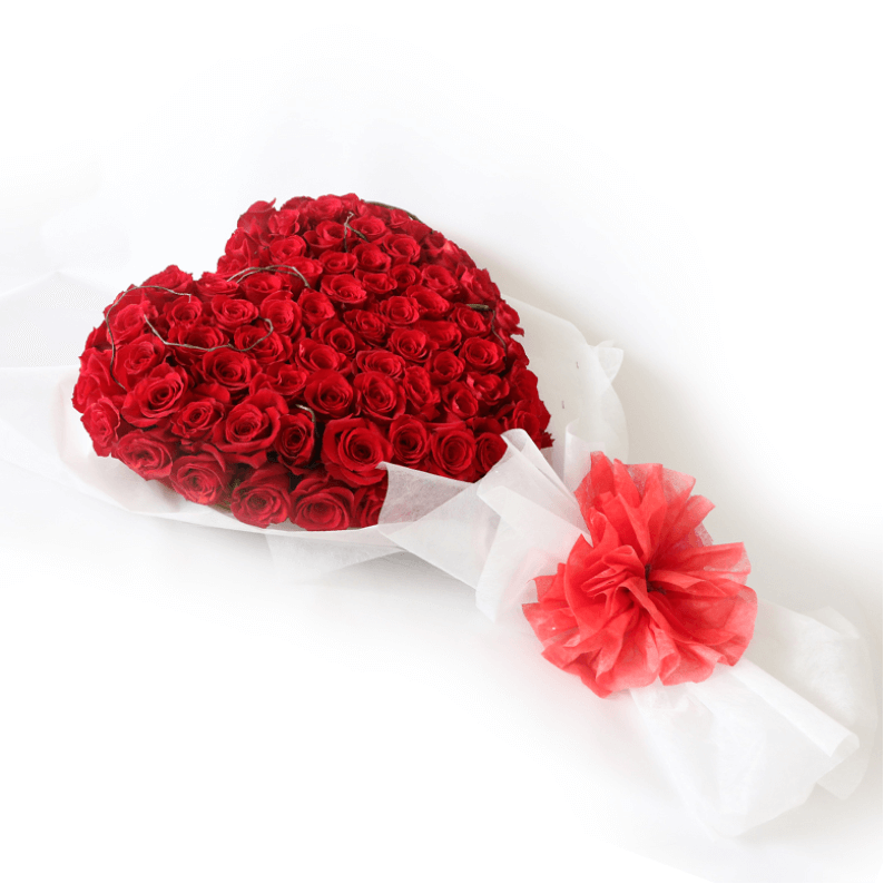 red rose heart shaped bouquet flat bouquet of red roses in a heart shape with white paper and red ribbon