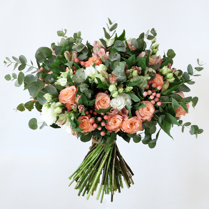 orange and white bouquet Orange roses, white eustoma, alstroemeria and eucalyptus