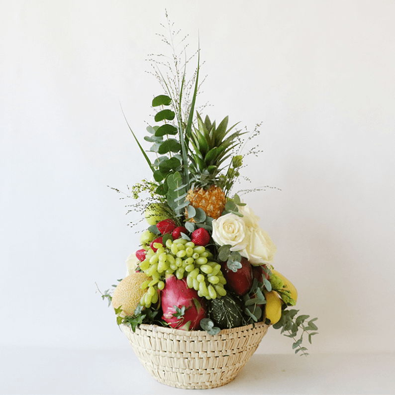 Luxurious Fruit basket_2 Luxurious fruit basket full of pineapples, grapes, melon, banana