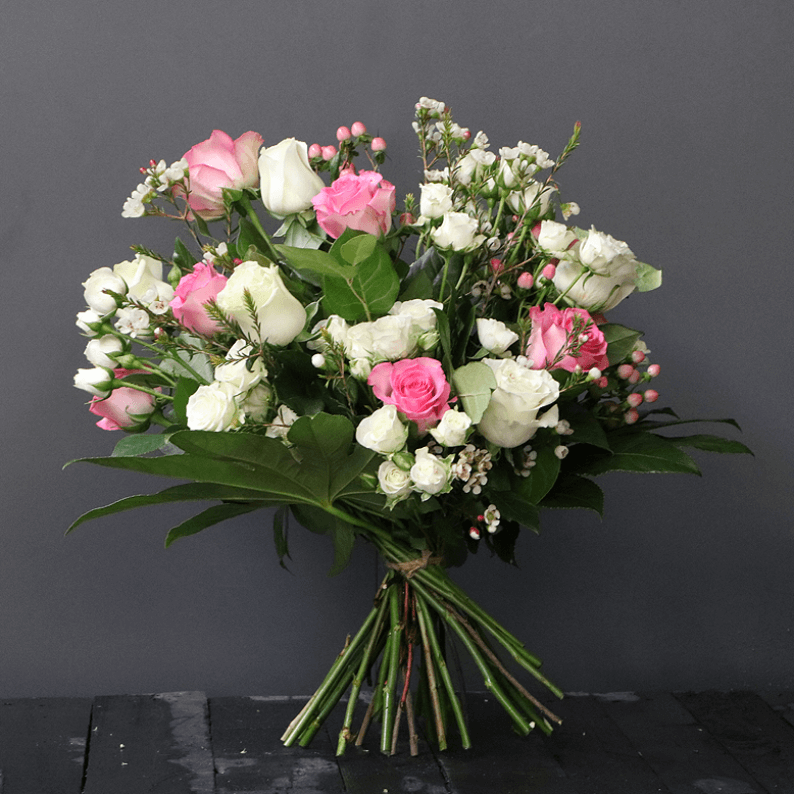 pink and white bouquet pink and white bouquet with roses, spray roses and wax flower