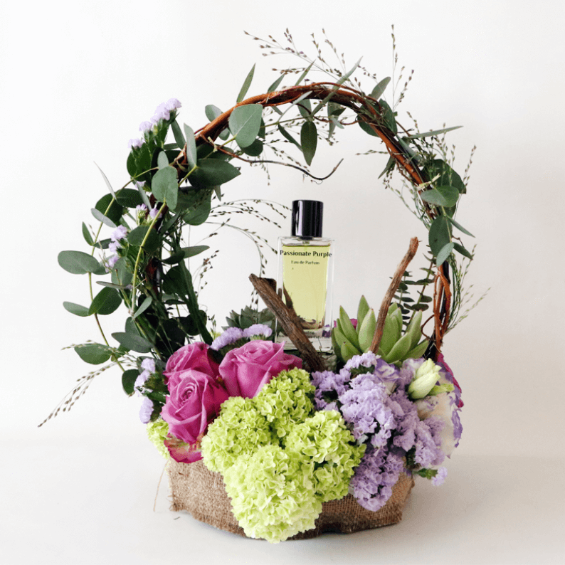 Passionate Purple Gift Design 1_2 Passionate purple perfume in an arrangement with purple roses, snowball and statice