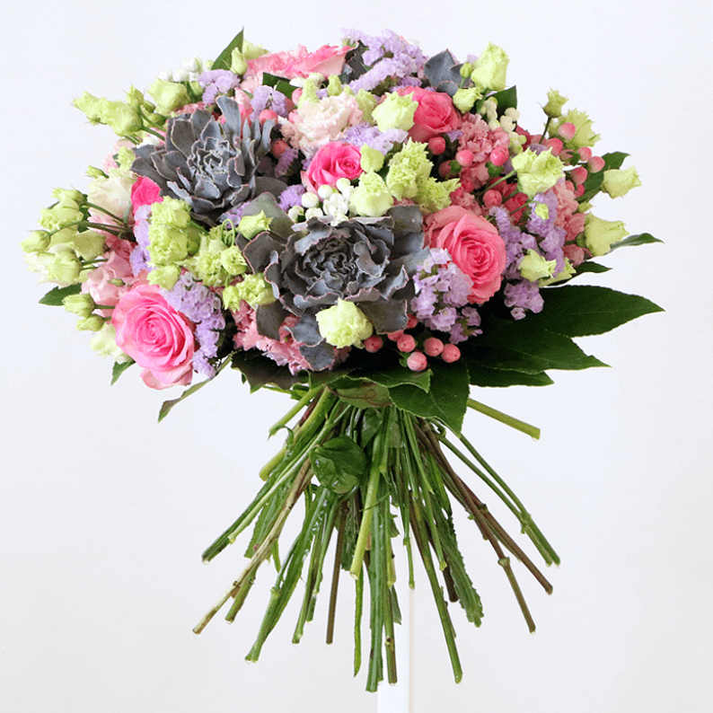 Pink, white and green bouquet with succulents pink roses, eustoma, succulents