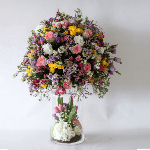 Valentine’s Day 1 mixture of spring flowers in a tall vase
