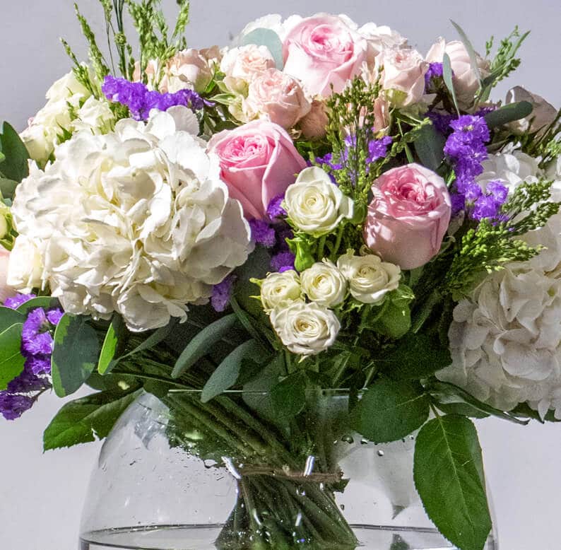 Moza 1 close up of pink, purple and white bouquet