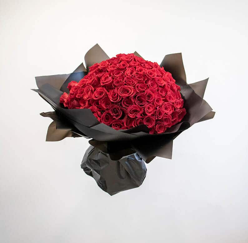 150 red roses 150 red roses wrapped in black paper