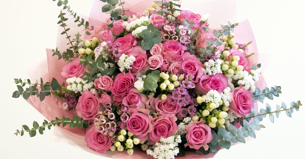 The Meaning of Roses 23 pink roses flower arrangemnets