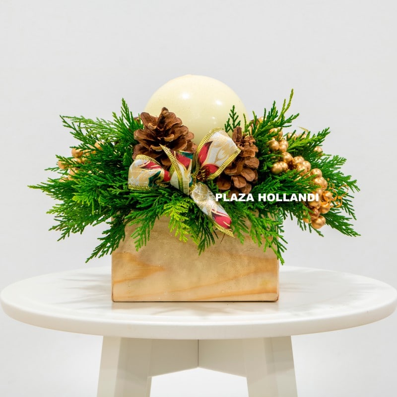 Festive arrangement with a large pillar candle Festive arrangement with a large pillar candle