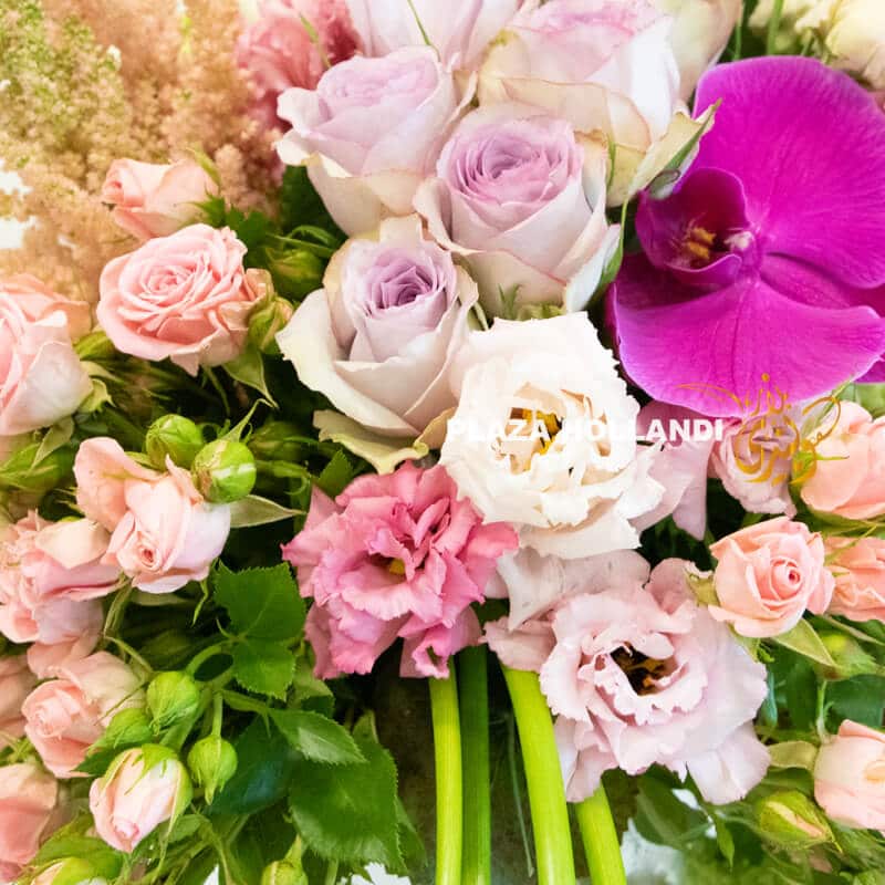 A13 A unique flower arrangement of pink and purple flowers