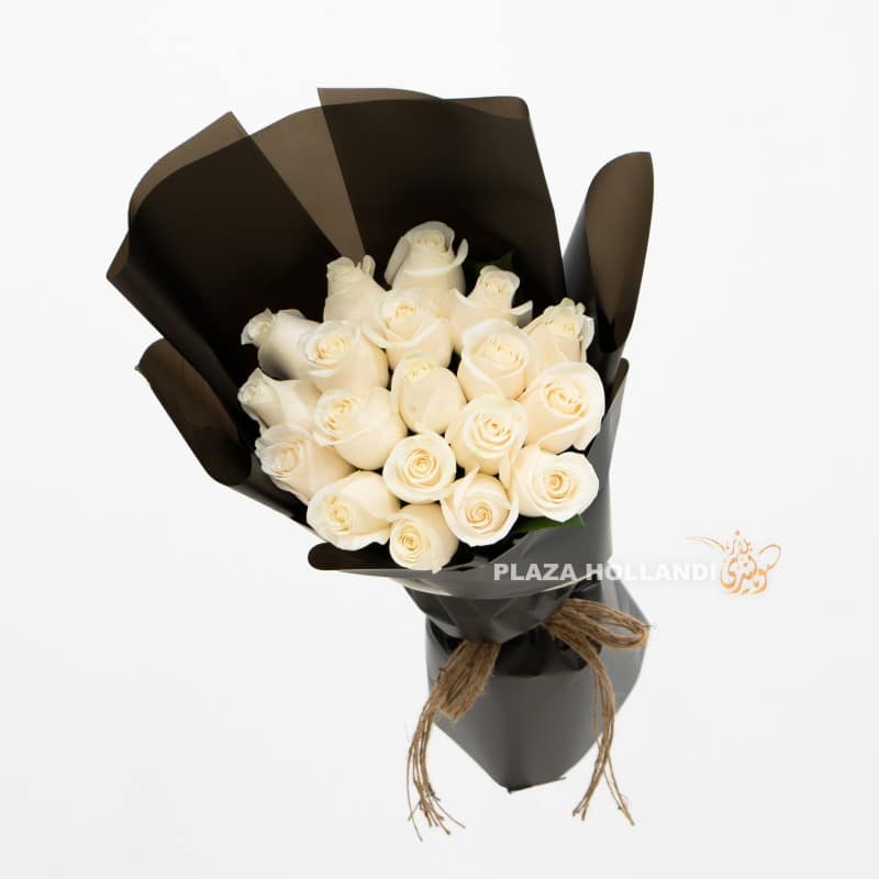 1.1 white roses in a bouquet