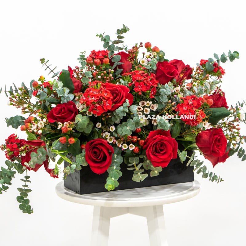 9.2 Red roses with eucalyptus in a black box